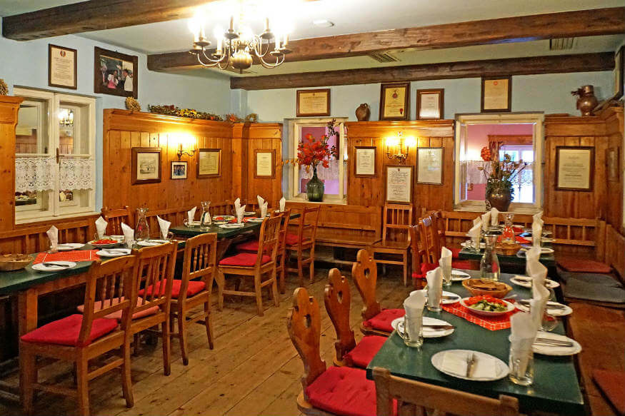 Eating at local restaurants will save you money while backpacking in Europe