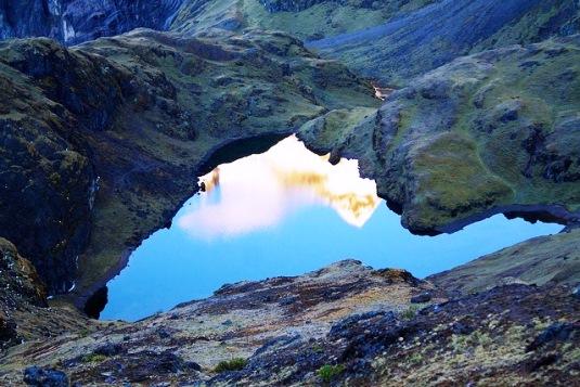 mountains reflected in water