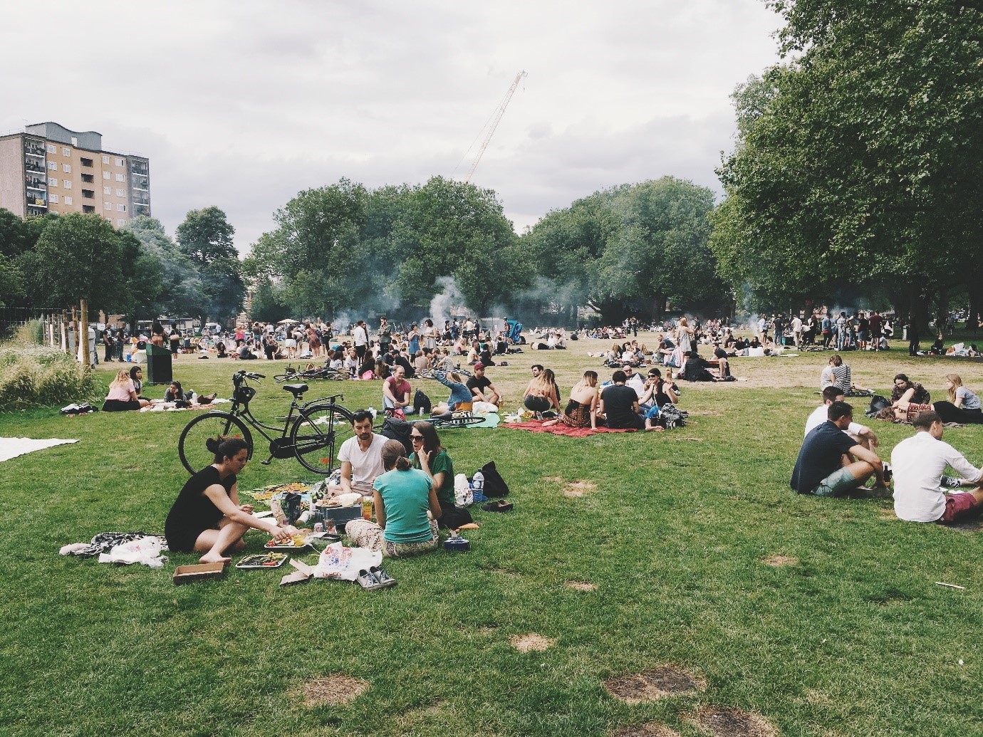 Save money on group trips - people in London Fields
