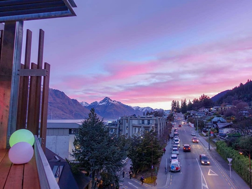 backpacking New Zealand - mountain view and road - queenstown hostel