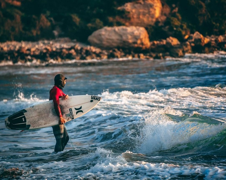 Things to do in Malta - surfer in Dwerja Bay