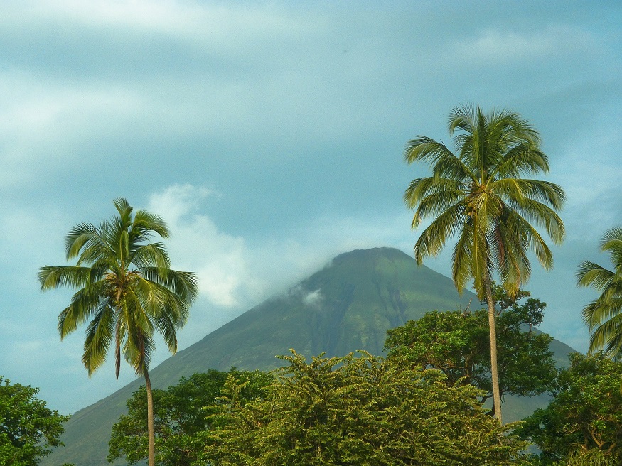 backpacking central america - mountain and palm trees