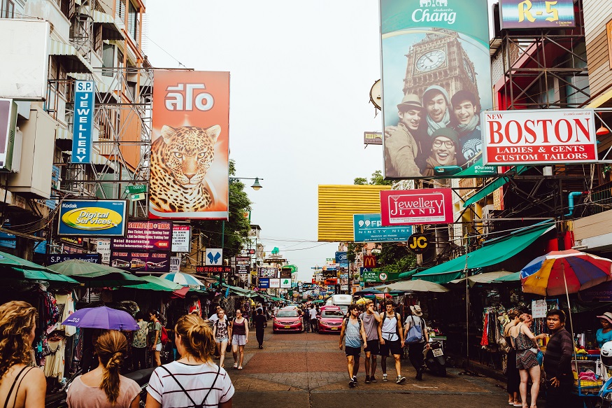where to stay in bagnkok - Khao San Road - market stalls and adverts along street