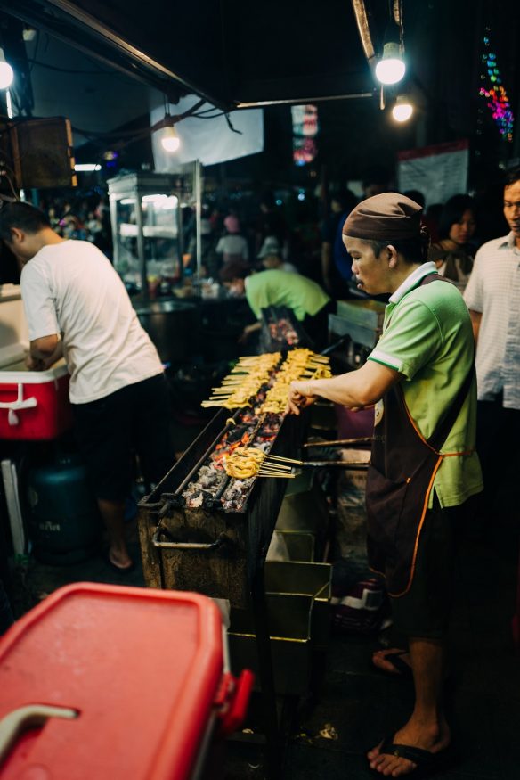 where to stay in Bangkok - places to eat - woman cooking
