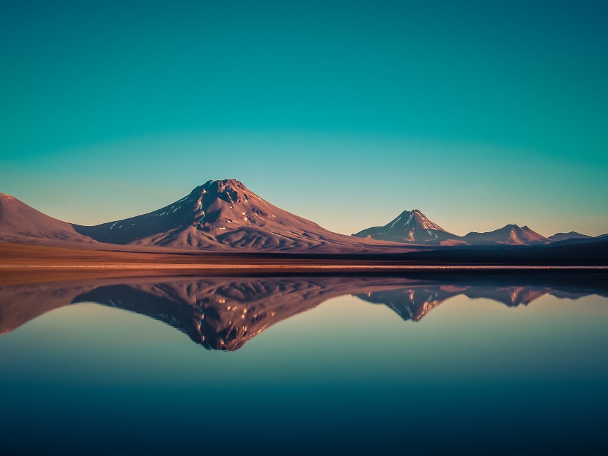 backpacking chile, view of a lake with reflection of the mountains