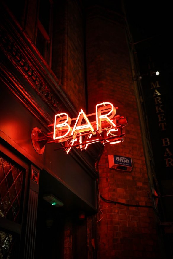 edinburgh on a budget, a red neon bar sign