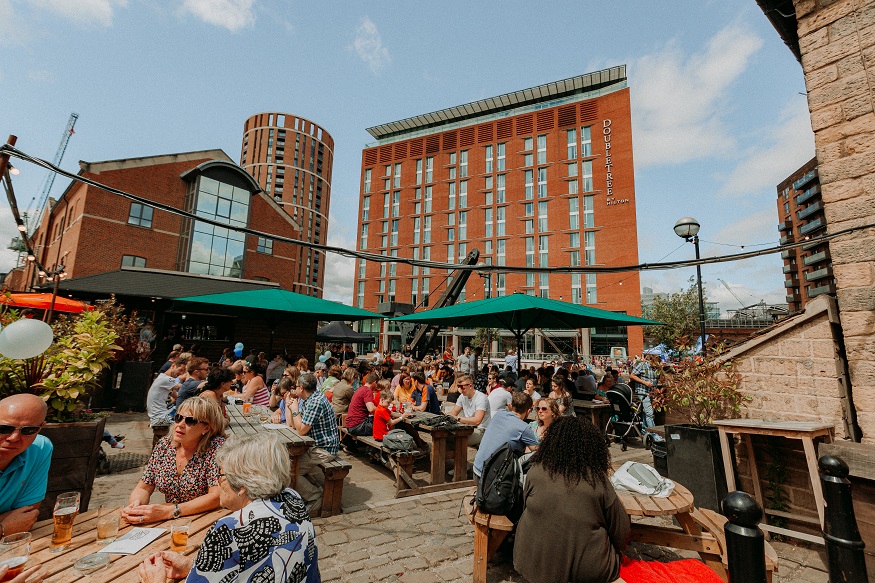 leeds on a budget, people sitting outside at water lane boathouse
