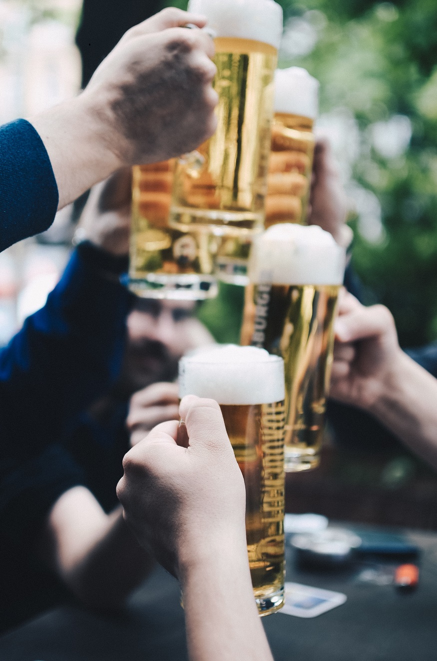 beirut nightlife, people cheering with beer