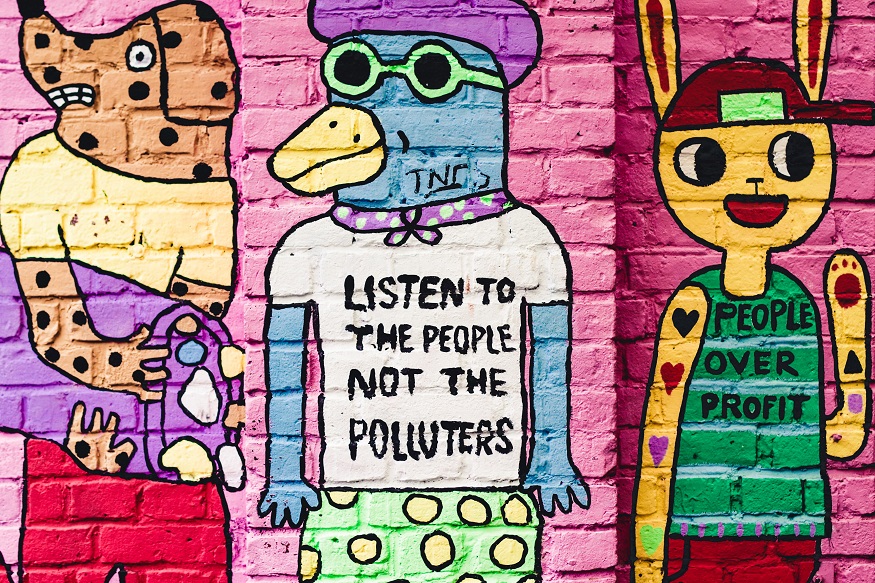 things to do in oslo, colourful graffiti art with slogans on a pink wall