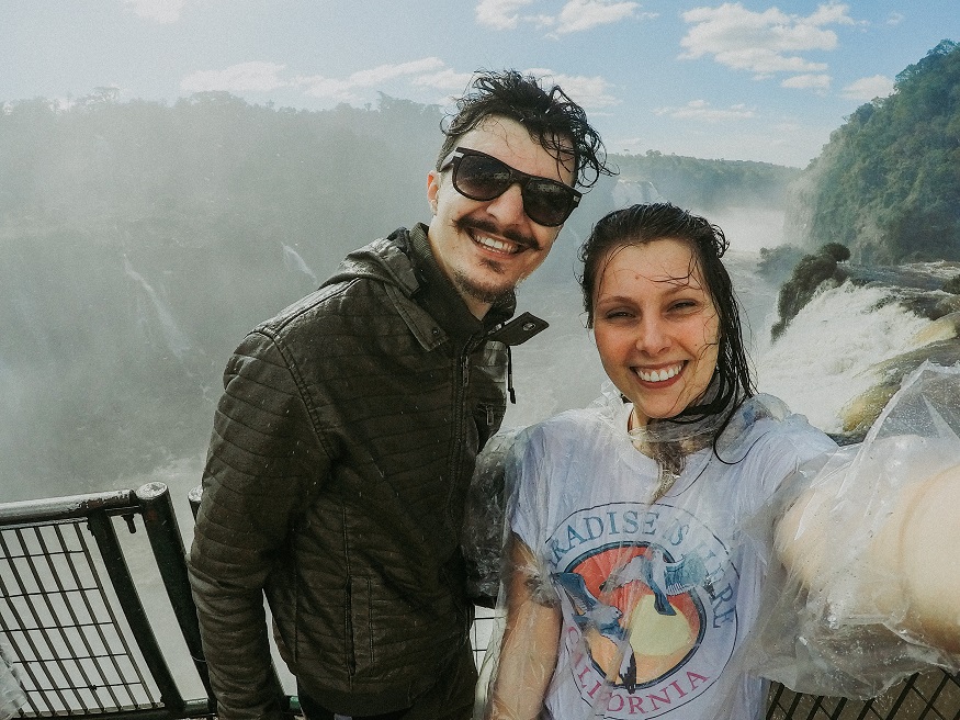 best places to visit in Argentina, people standing by the waterfalls in iguazú 