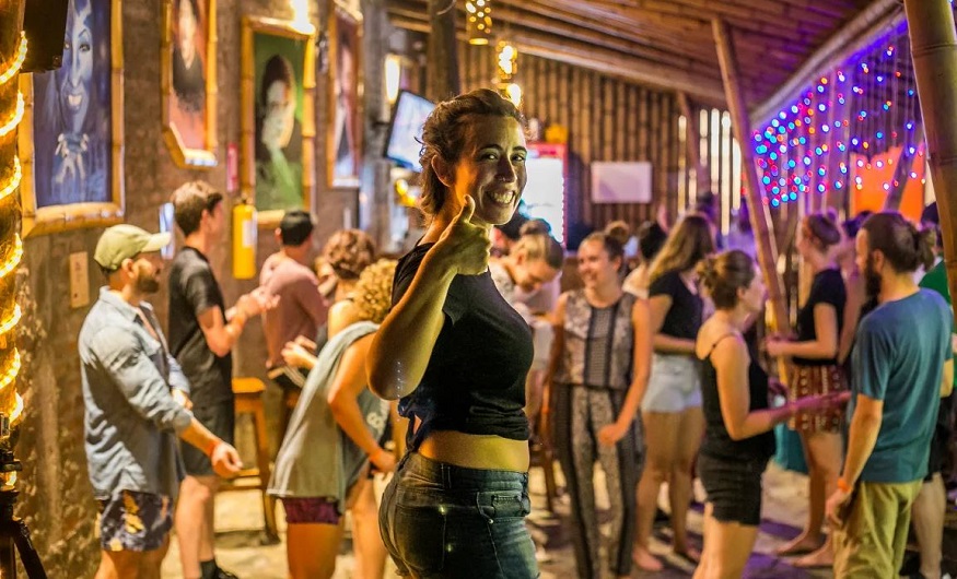 best places to visit in colombia, girl with thumbs up at viajero cali hostel & salsa school