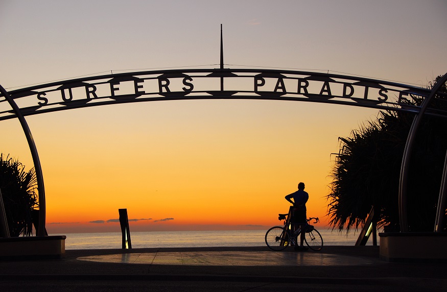 travel east coast australia,person standing at Surfers Paradise Gold Coast at sunset