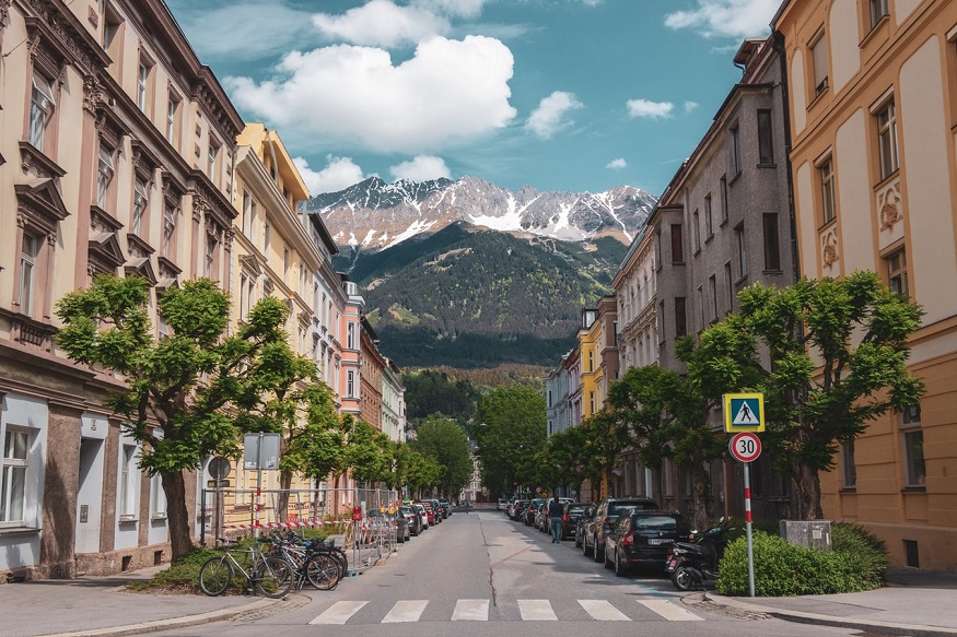 Things to do in Innsbruck - street of Innsbruck with the mountains in the background