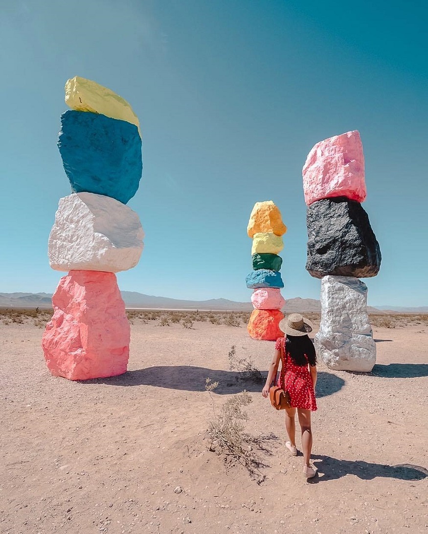 best destinations for book lovers, girl by seven magic mountains, las vegas