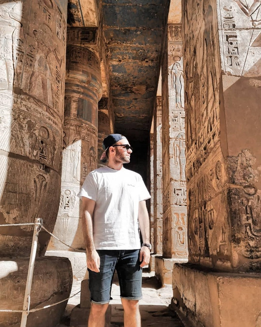 best destinations for book lovers, man in luxor Egypt