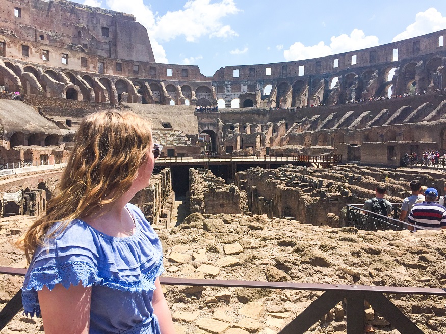 best romantic destinations for solo travellers, girl inside the colosseum