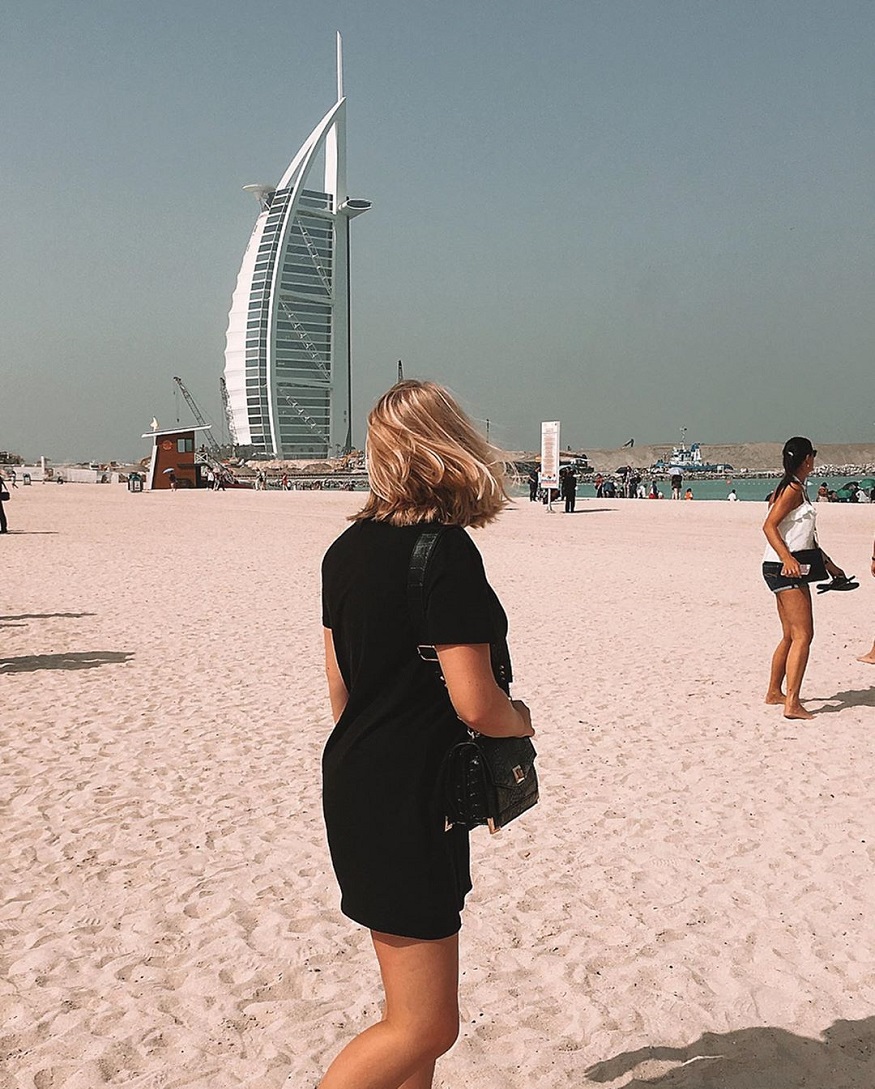 best romantic destinations for solo travellers, girl on beach in dubai