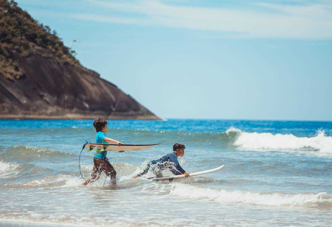 Two surfers in brazil sponsored by Hostel de Villa, nominated for extraordinary community and social impact hostels award