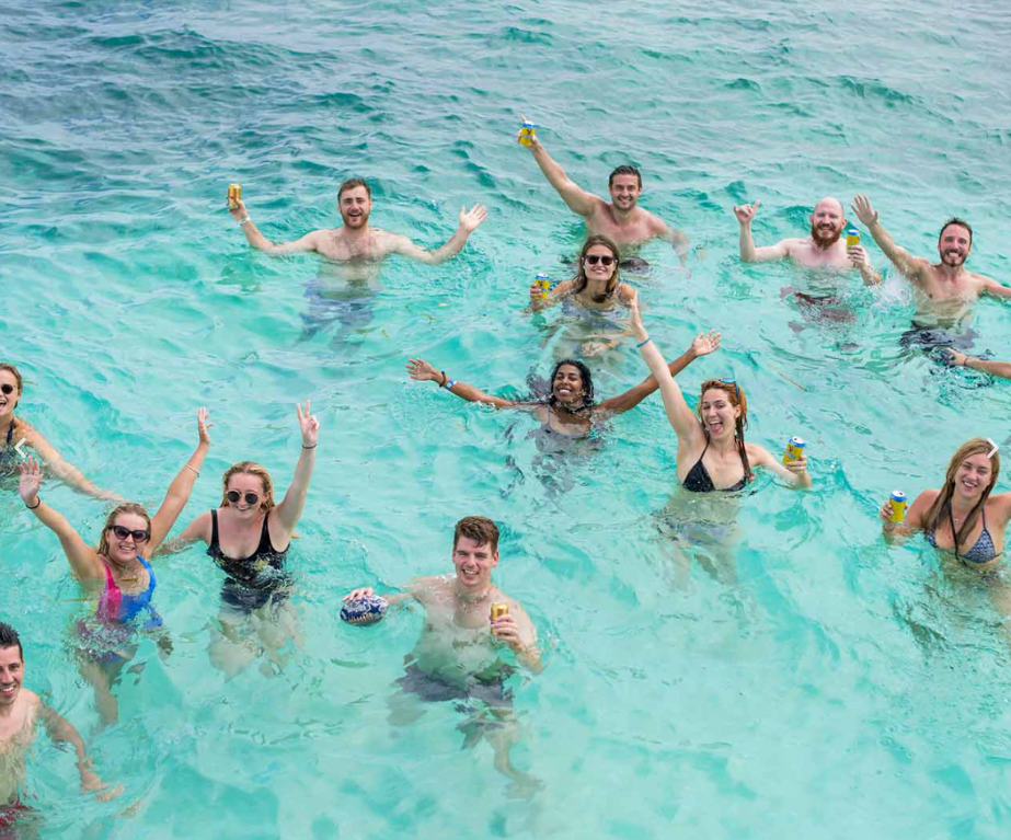Hostel Community Enjoying Sea Bathing at Casa en el Agua Hostel