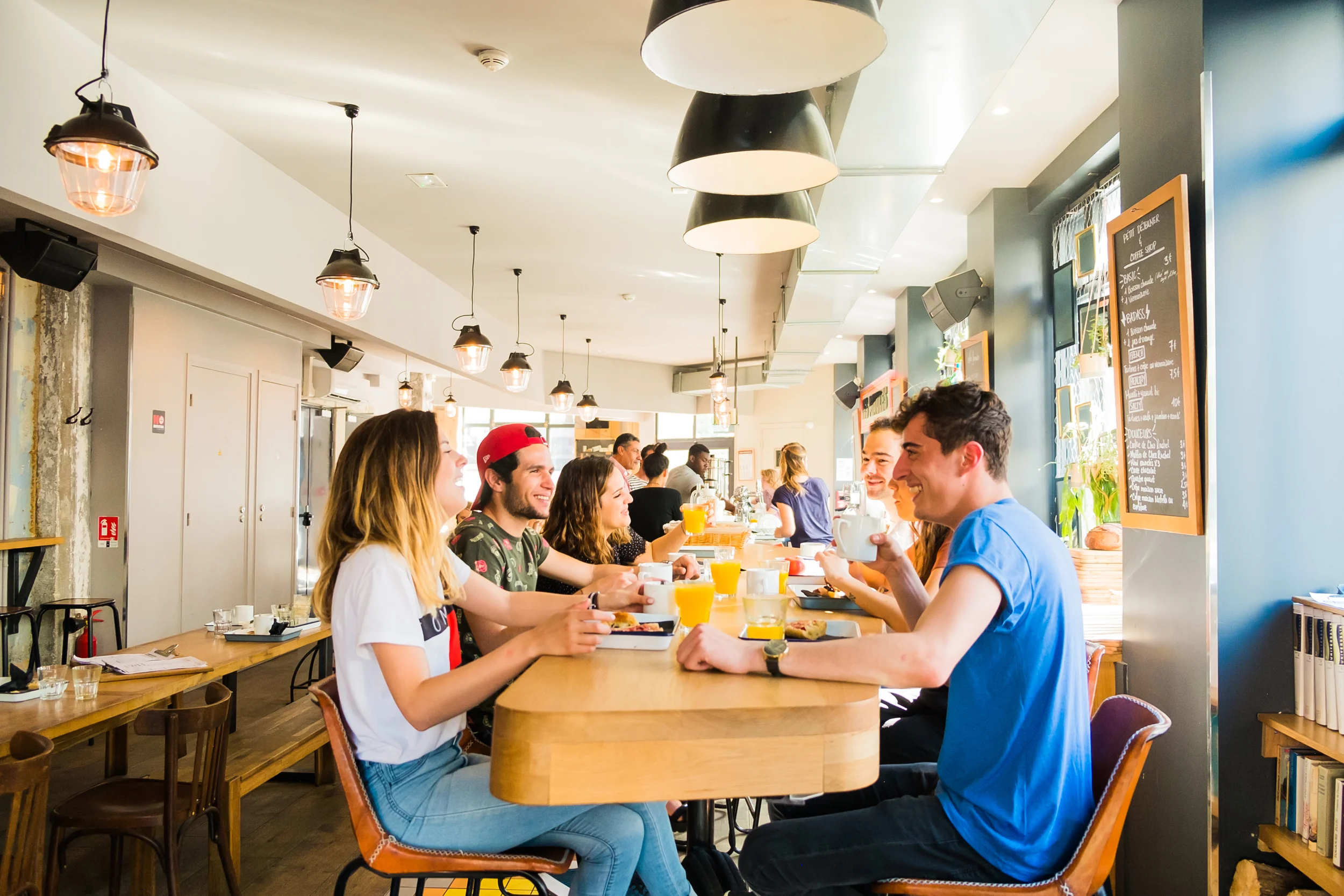 people eating together in a hostel