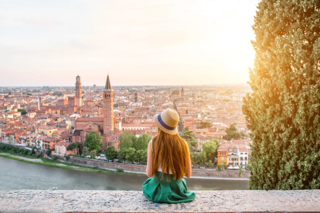 Woman enjoying beautiful view on Verona city