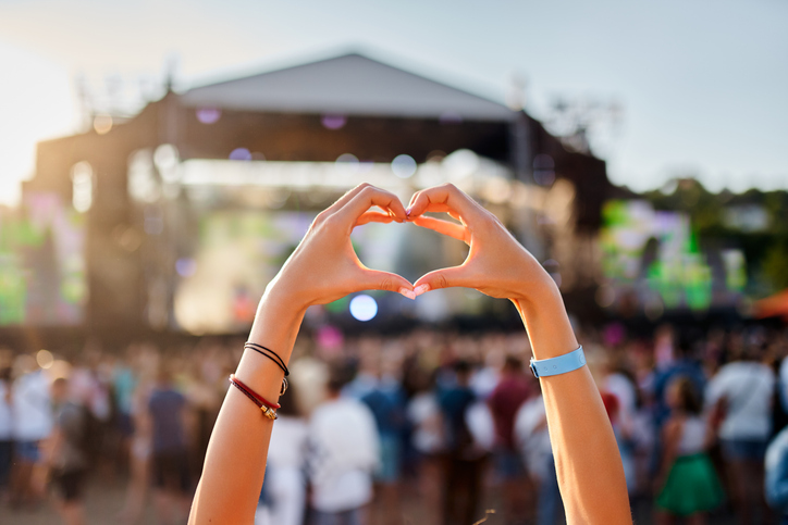 Concertgoer Forms Heart Shape with Hands