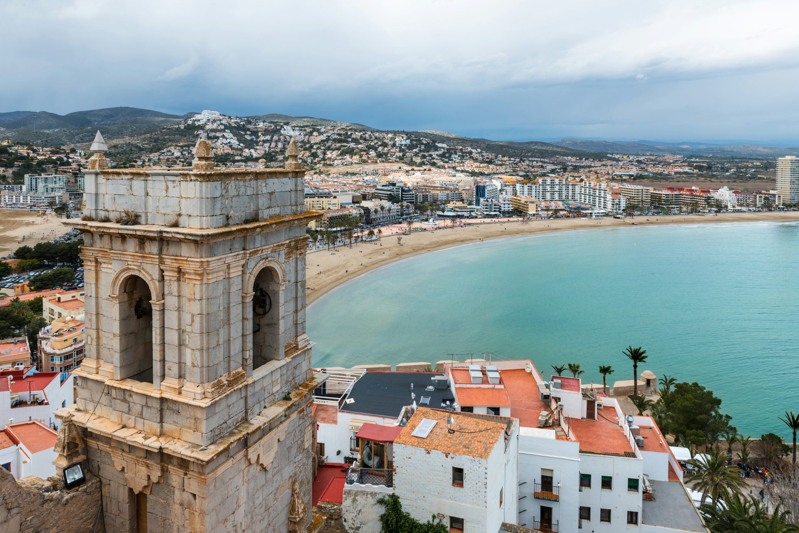 aerial-view-of-the-fortified-city-and-port-of-peniscola-peniscola-in-the-costa-del-azahar-in-castellon-on-a-rainy-day-valencian-community-in-spain