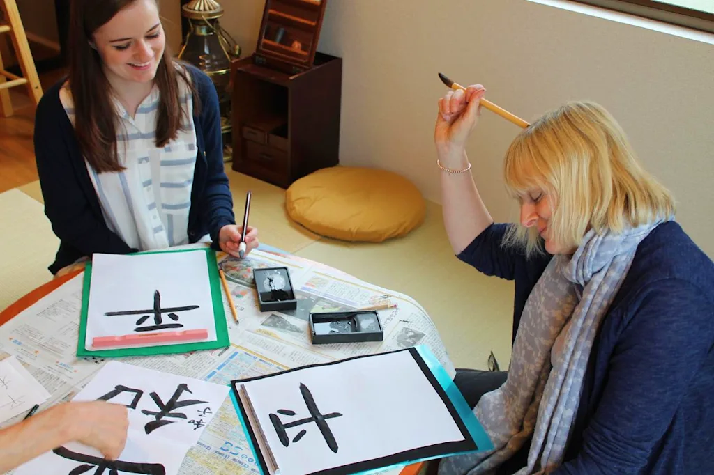 women doing a japanese caligraphy class