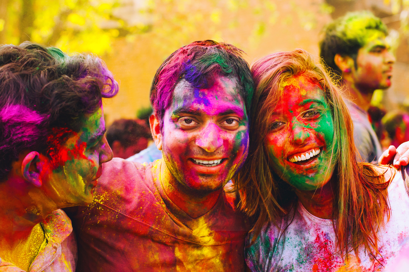 People Smiling at Holi Festival