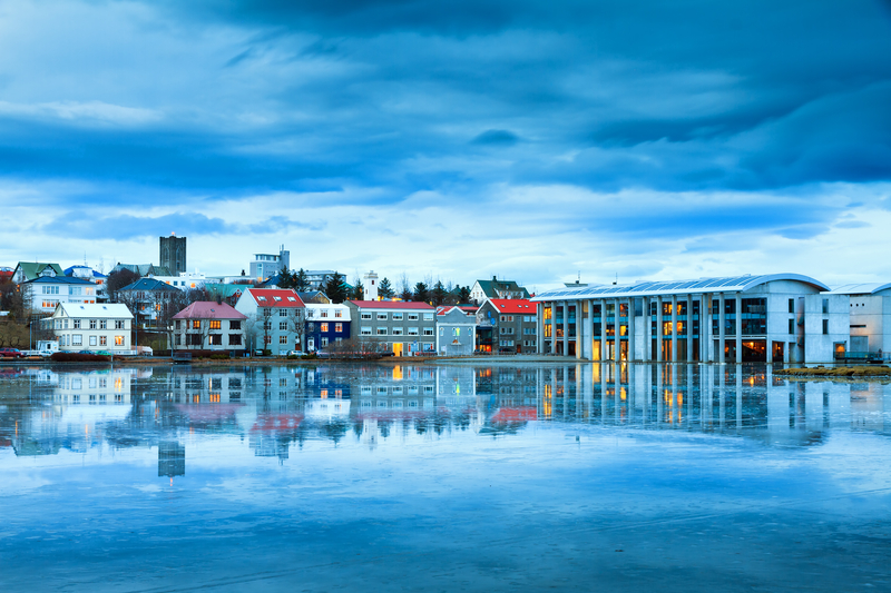 Reflection of the Cityscape of Reykjavik in lake Tjornin - Where to Stay in Reykjavik