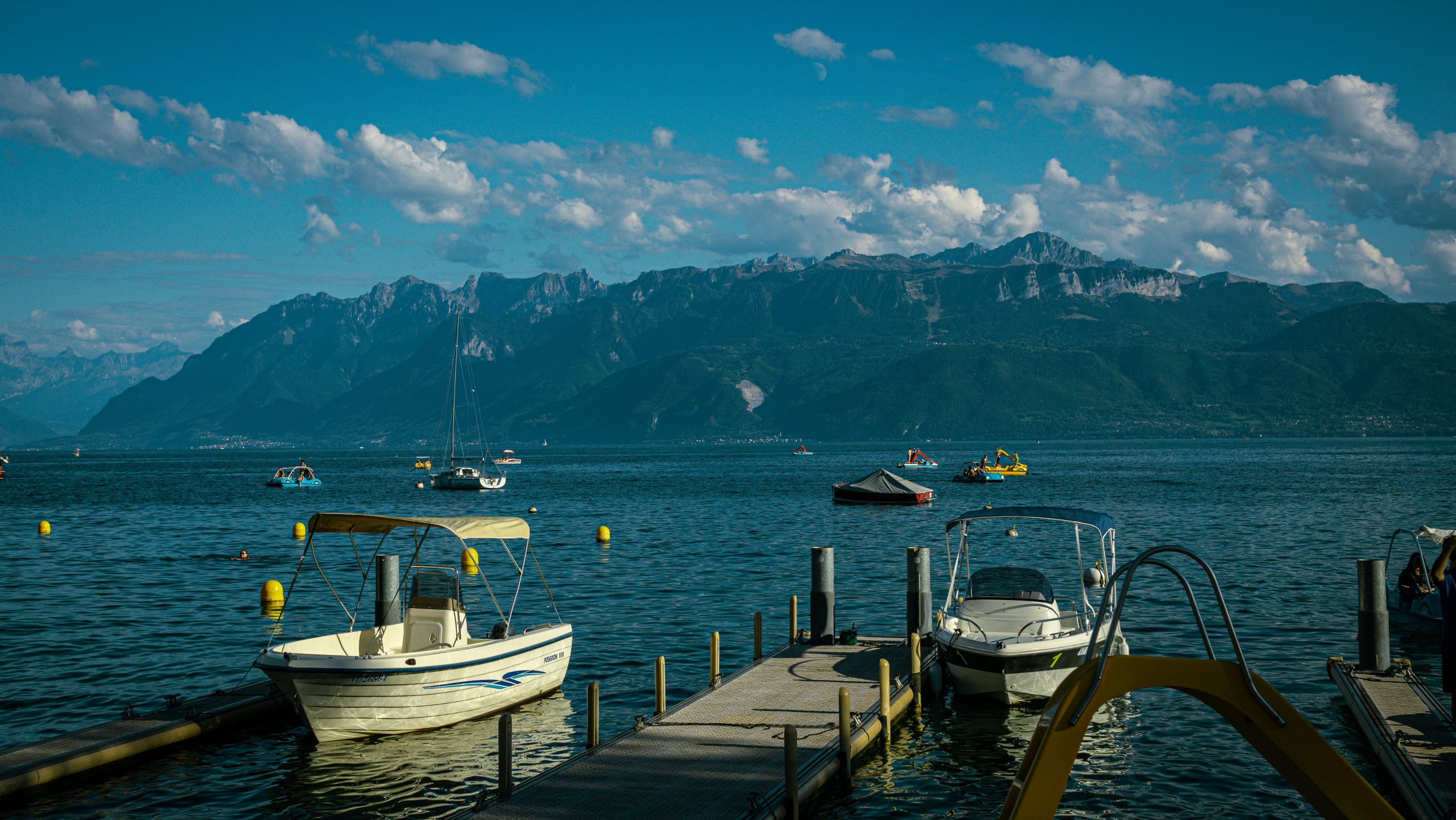 boats in the water in a lake in switzerland