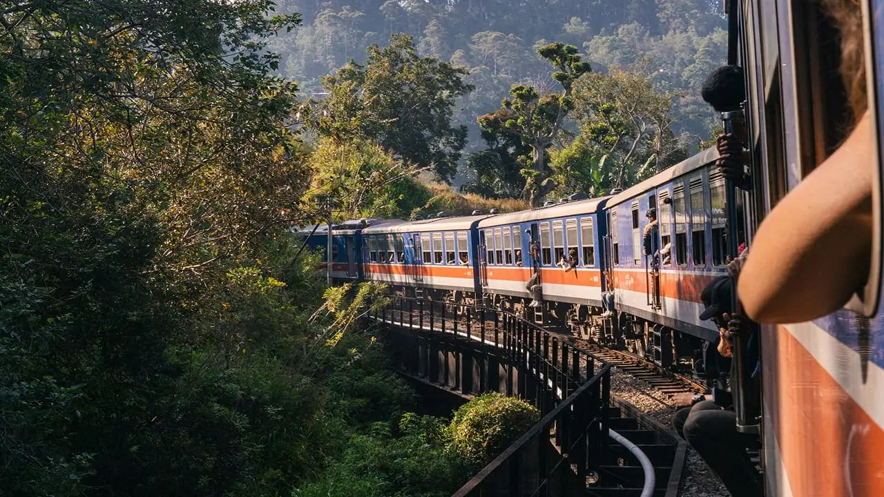 A hill-country train crossing a viaduct, seen from the carriage window